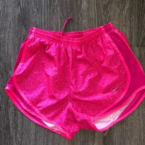 Hot pink Nike running shorts
